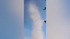 Terrifying dust devil tornado whips up rubbish in Myanmar village