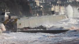 New sea wall take a hammering from monster waves. Dawlish in Devon, England.
