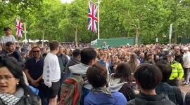 Crowds and media descend on The Mall outside Buckingham Palace the day before the Platinum Jubilee holiday
