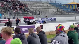 Drag racer escapes unscathed after his car crashed and erupted into flames