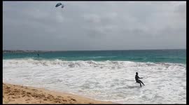 Kite surfer takes a high fall.  It is a tough job handling these.