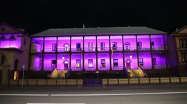The New South Wales Parliament building on Macquarie Street, Sydney, Australia is lit up purple to mark the Queen’s Platinum Jubilee.