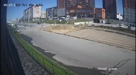 The car demolished road signs, a concrete fence and fell into a construction pit