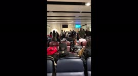 UK: Passengers React In Dismay At Flight Cancelation Announcement At Gatwick Airport