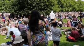 Huge Amount Of People Sitting In St James Park Watching Trooping The Colour