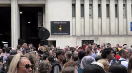 Platinum Jubilee celebrators make way for military convoy at Wellington Barracks