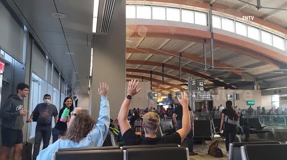 Airline Passengers Cheer when Plane Begins Boarding after Hours Long Wait Due to Storms
