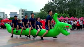 Firemen win mock dragon boat race on land to celebrate Chinese Festival