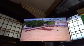 Queen's Platinum Jubilee - londoners enjoy Trooping the Colour parade at The Golden Lion pub in St James's