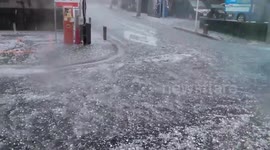 Freak storm pummels Japan with heavy rain and hail