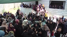 Mourners attend the funeral of Palestinian Auda Sadaqa who was shot killed by Israeli froces