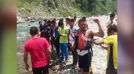 Stuck in middle of river, two students rescued by officials in northern India