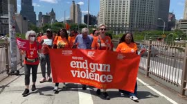 “Save our children”: Gun violence prevention demonstrators march across Brooklyn Bridge