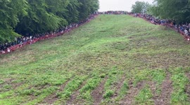 Non-cheese eating Brit wins the first race of the Gloucestershire Cheese Rolling