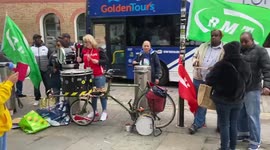 Rail workers stage a protest outside St Pancras International station