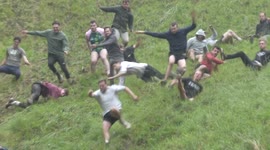 Slow-mo video captures the most spectacular falls at UK cheese-rolling race