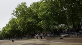 Motorcyclist Brakes Down During Royal Parade