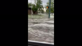 Floodwater flows through Lamar streets as thunderstorms strike Colorado