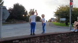''It's the simple things!' Excited boys get their day made after a passing truck honks at them '