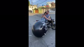 Sao Paulo couple reveal baby's gender by inflating balloon using motorbike