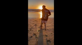 'Football + Beach + Sunset View = A Whole Vibe! *Relaxing*'
