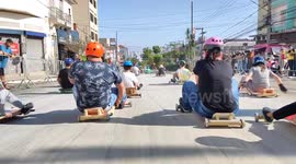 Dozens skate down the streets of Sao Paulo on wooden carts