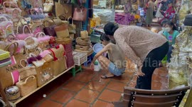 Desperate locals collect rainwater in bottles amid shortage of clean drinking water