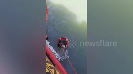 Hero ship captain dives into sea to rescue drowning puppy in Thailand