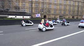 Vintage C5 Sinclaire 1985 electric vehicles spotted outside the Houses of Parliament in London
