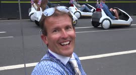 Vintage Sinclaire C5 electric vehilcles spotted driving past the Houses of Parliament in London