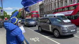 Protesters boo Boris Johnson’s motorcade outside Parliament