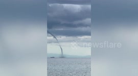 Terrifying waterspout forms near boat during storm in the Philippines