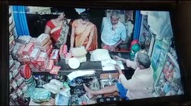 Watch - Two well dressed ladies caught in cctv camera stealing breads from a grocery shop in Munger