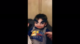 My son being silly with Snapchat filters with big eyebrows he’s so cute