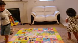 Dancing sibling toddlers