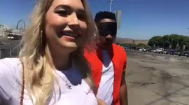 Blindfolded man hits signpost