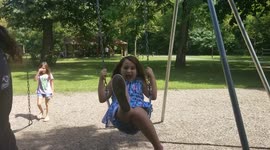 Man falls through swingset