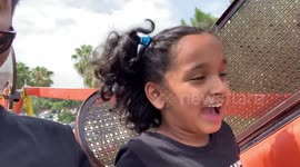 Girl scared on ferris wheel