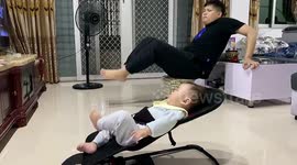 Like father, like son: Toddler on rocking chair copies his dad's actions