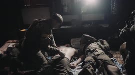 Medics treat Ukrainian troops in pitch-dark field hospital