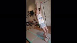 Cheerleader lands first back tuck and very proud of herself.