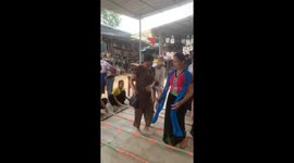 Adults and children perform extremely unique traditional bamboo dance in Vietnam