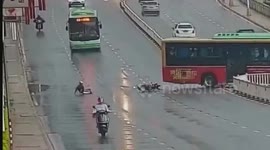 Quick-thinking driver swerves bus across highway to avoid crashing scooter rider
