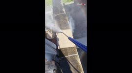 Wall changes colour in satisfying jet-washing clip
