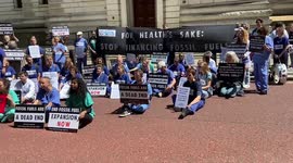 Extinction Rebellion doctors and nurses protest outside the Treasury, London