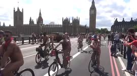 Hundreds of naked bikers pass by British parliament