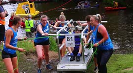 Thousands cheer on teams racing while carrying beds in North Yorkshire town