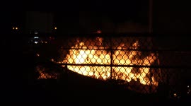 Firefighters respond to a trash fire at a construction site in Downtown Houston