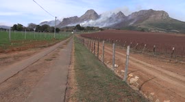 Mountain range fire threatens vineyards in Cape Town