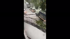 Intense hail storm pummels Mexican capital blanketing streets white